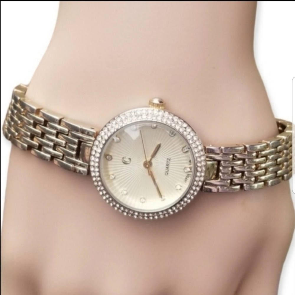 CHARMING CHARLIE GOLDTONED & CRYSTAL WATCH
